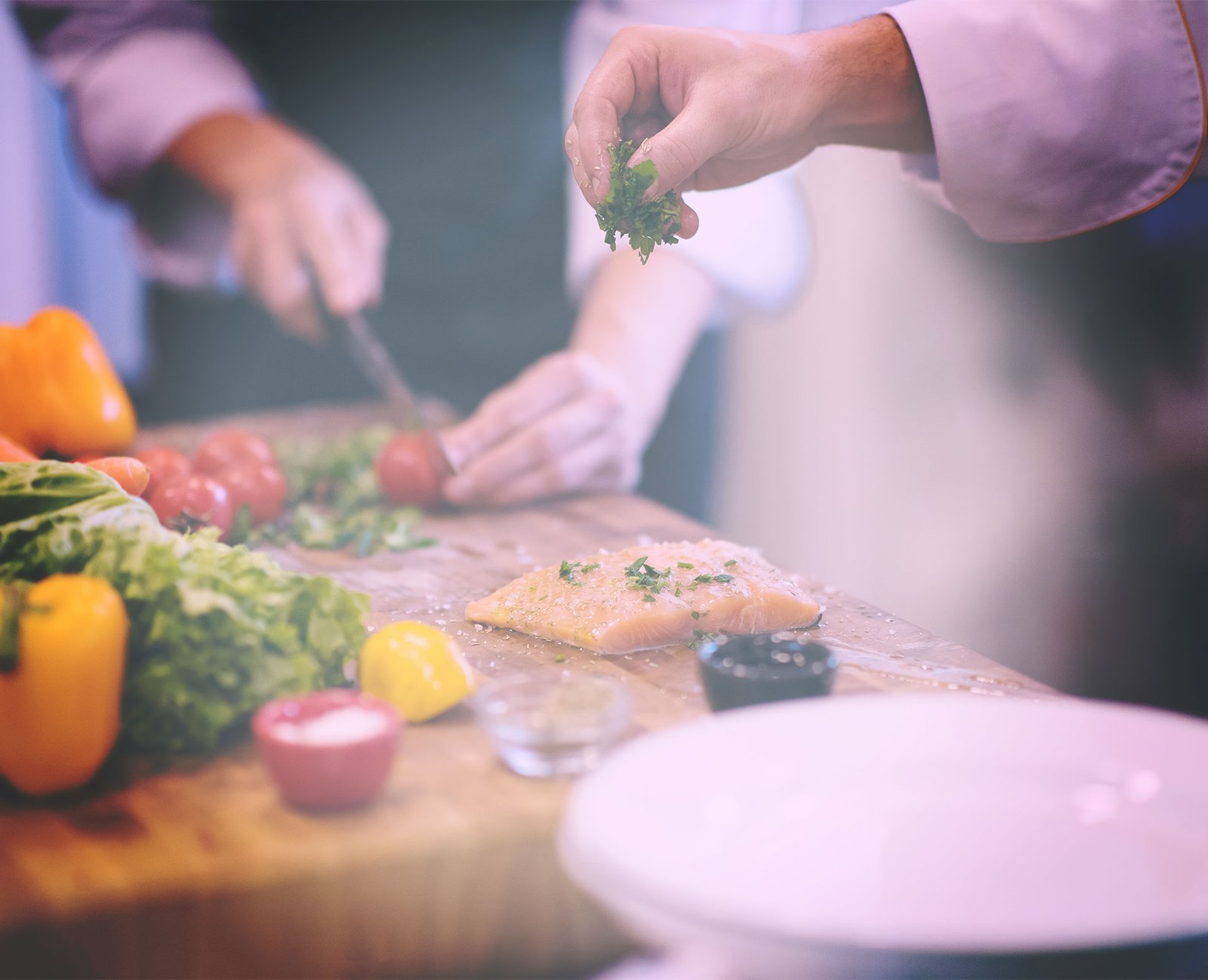 chef hands preparing fresh ingredients on wooden board, bucca mor kitchen craft cornwall
