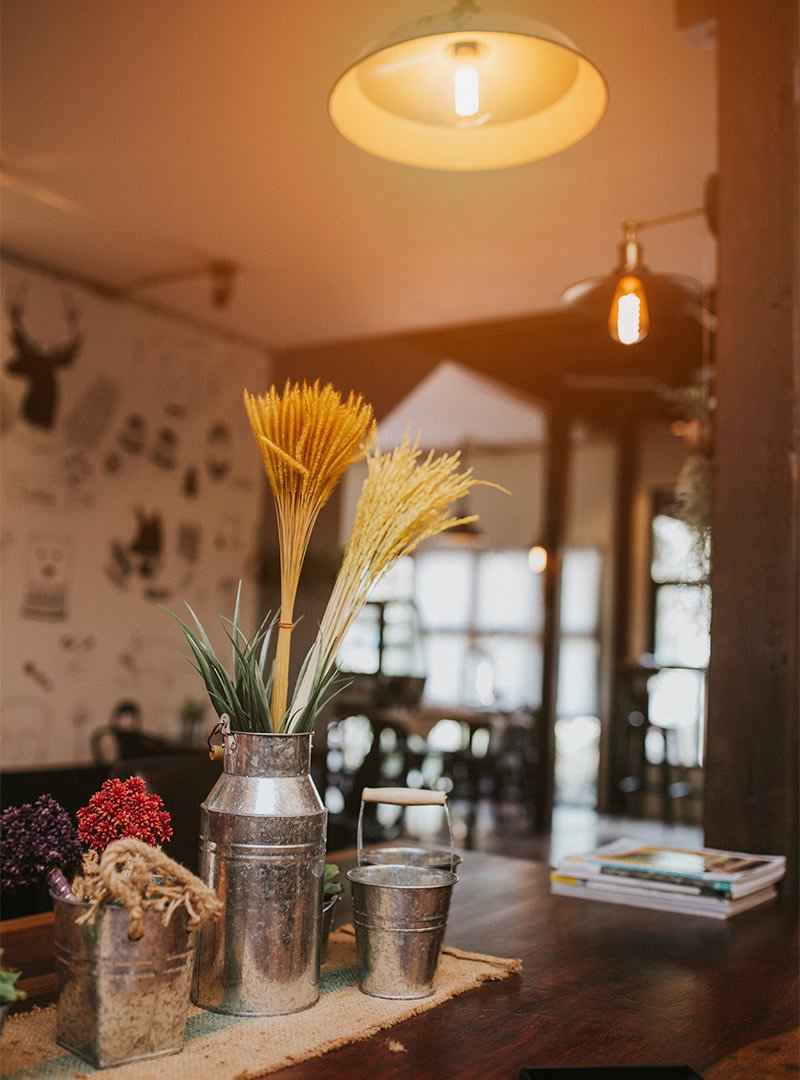 Rustic interior with flowers and natural textures in warm light